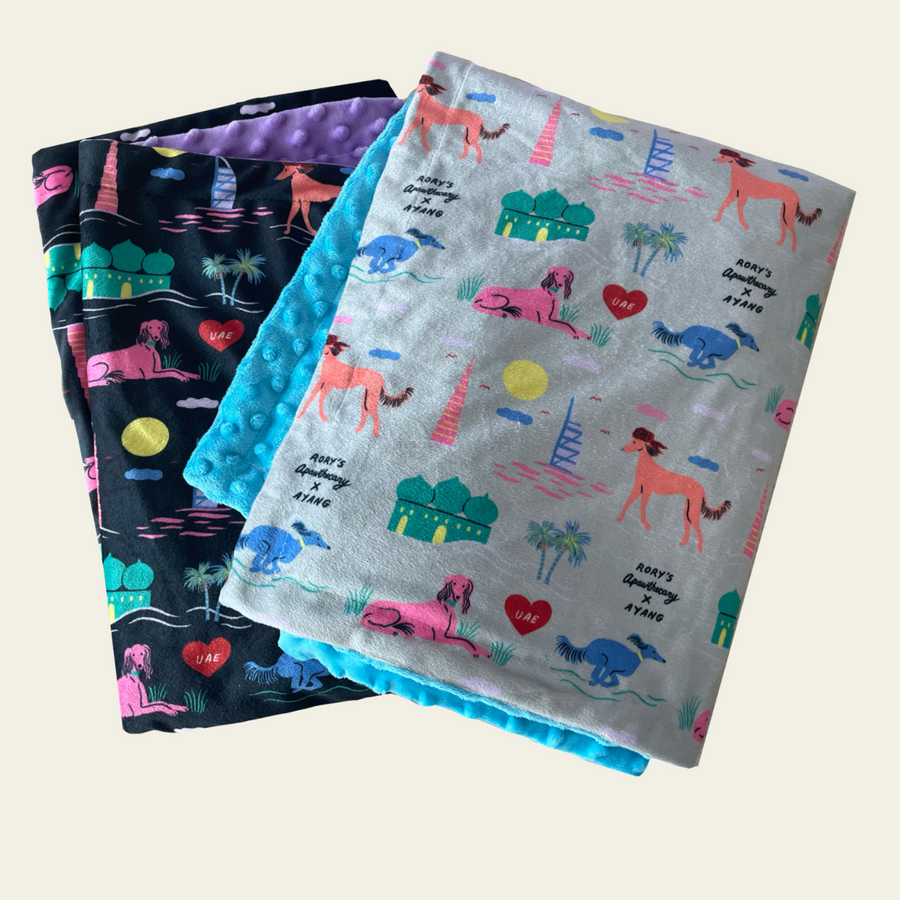 Lightweight, ultra-soft dog blanket from Rory’s Apawthecary, perfect for warmth and comfort year-round. UAE themed. Ayang Cempaka illustrator. Dubai and Abu Dhabi attractions. Perfect gift from the UAE for any dog parent.