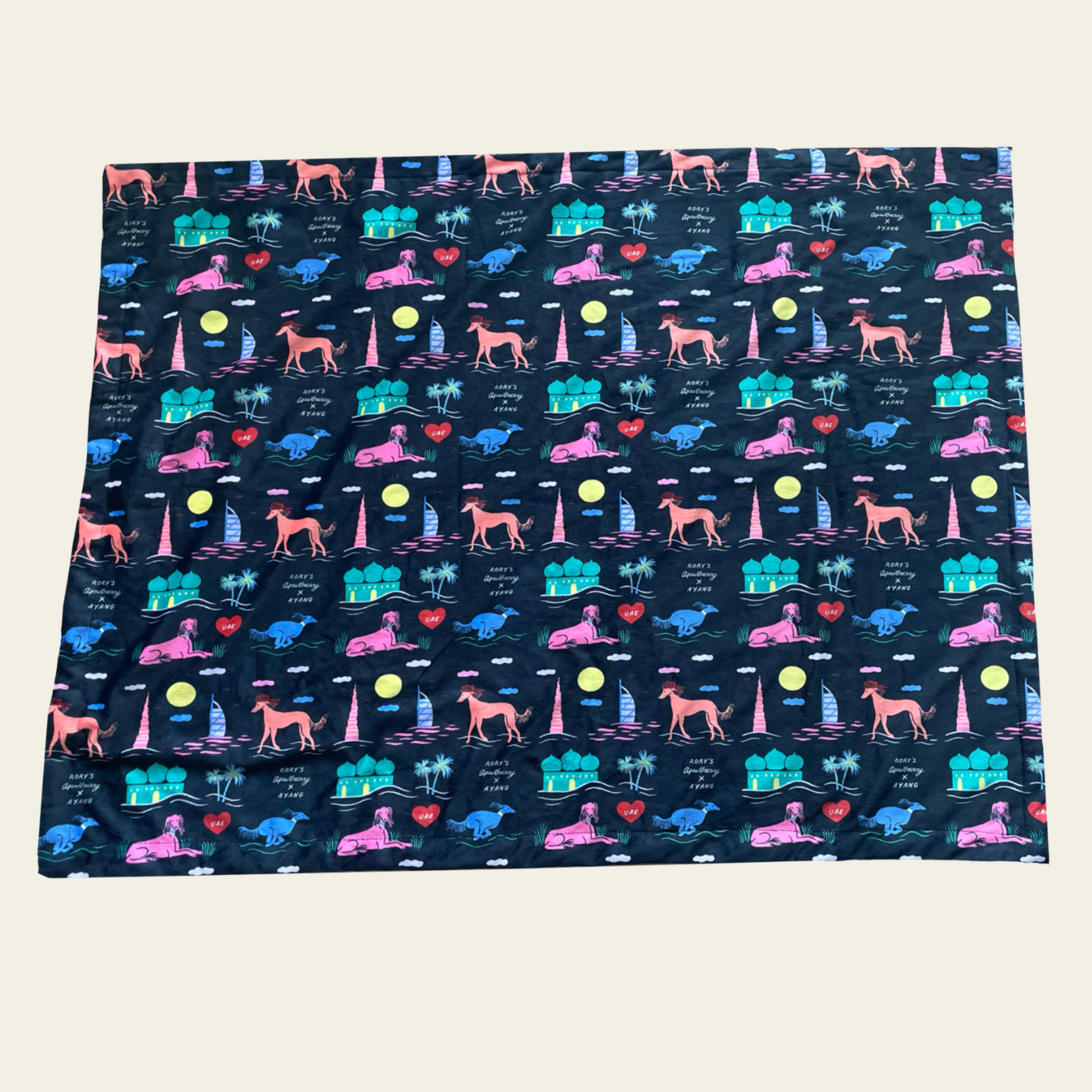 Lightweight, ultra-soft dog blanket from Rory’s Apawthecary, perfect for warmth and comfort year-round. UAE themed. Ayang Cempaka illustrator. Dubai and Abu Dhabi attractions. Perfect gift from the UAE for any dog parent.