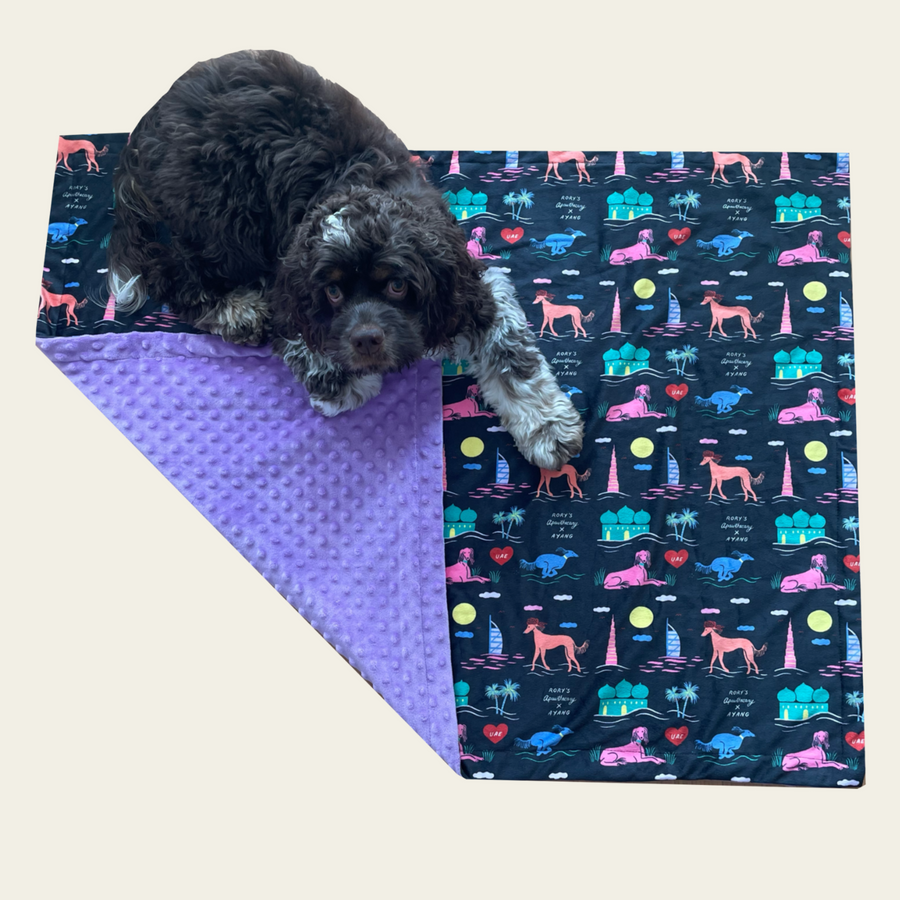 Lightweight, ultra-soft dog blanket from Rory’s Apawthecary, perfect for warmth and comfort year-round. UAE themed. Ayang Cempaka illustrator. Dubai and Abu Dhabi attractions. Perfect gift from the UAE for any dog parent.