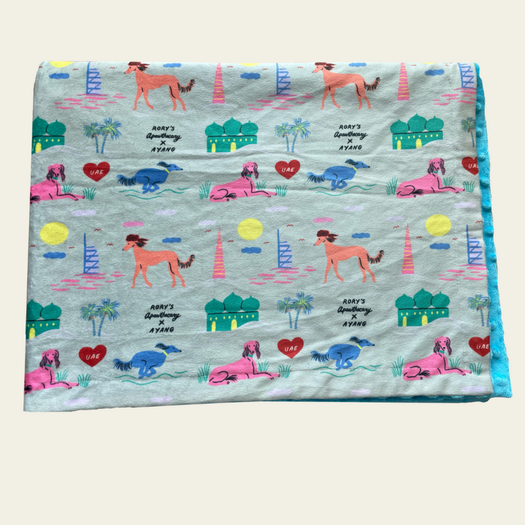 Lightweight, ultra-soft dog blanket from Rory’s Apawthecary, perfect for warmth and comfort year-round. UAE themed. Ayang Cempaka illustrator. Dubai and Abu Dhabi attractions. Perfect gift from the UAE for any dog parent.