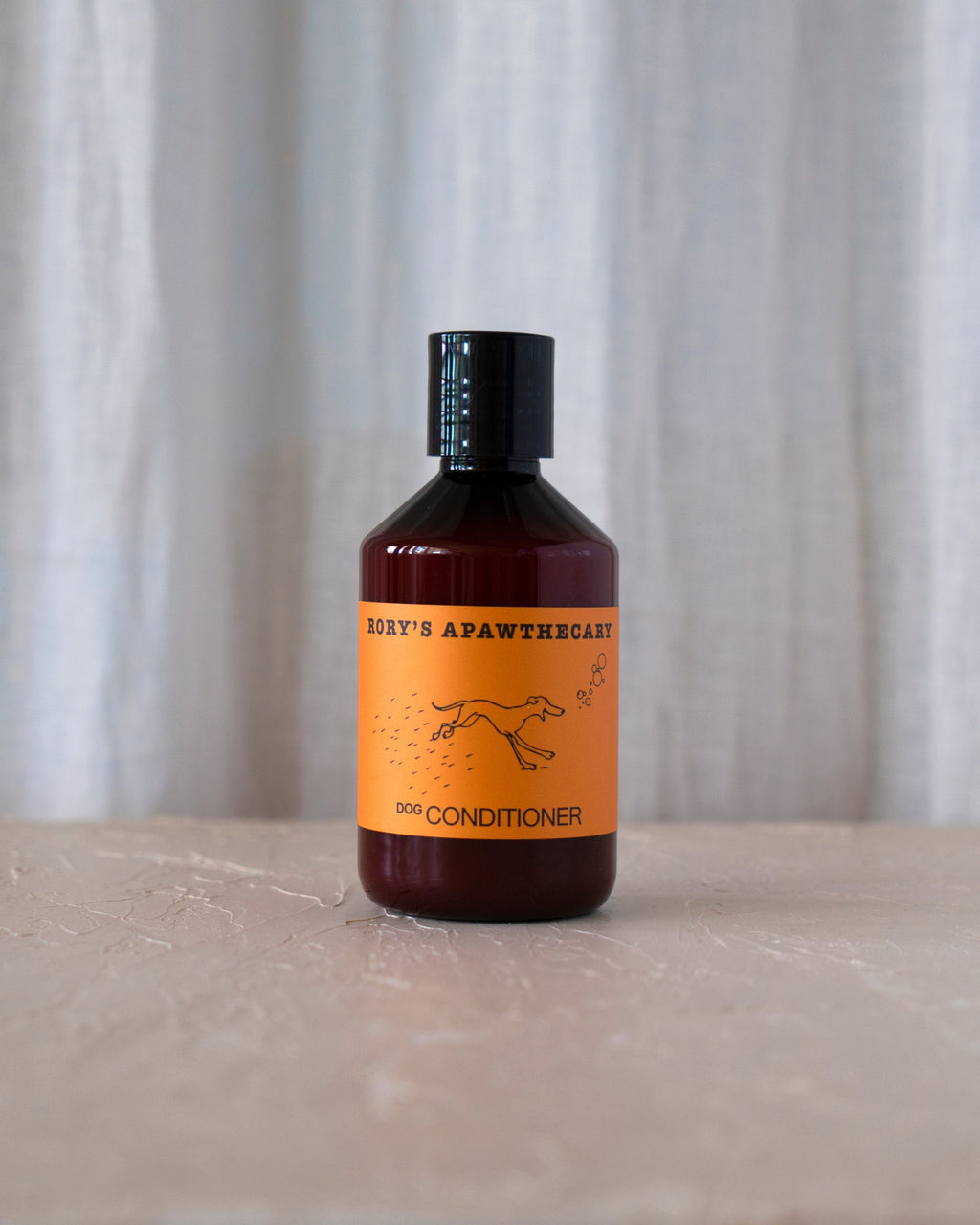 Natural dog conditioner with oats, cedarwood, and argan oil in eco-friendly packaging – gentle detangling and flea-repelling formula for all dogs